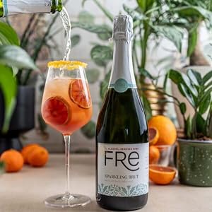 Fre Brut with mocktail and oranges