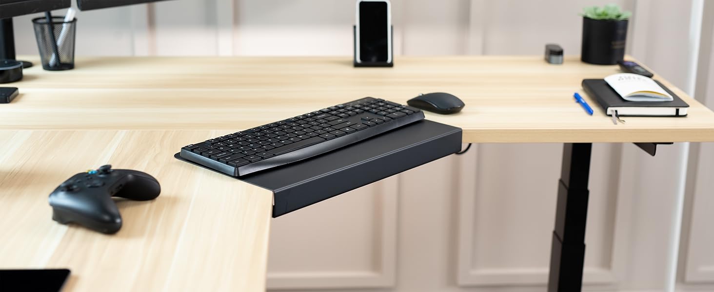 black corner connector on light wood desktop
