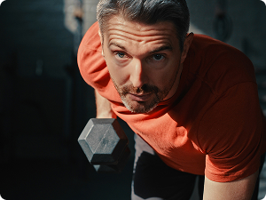 Man using weights in the gym