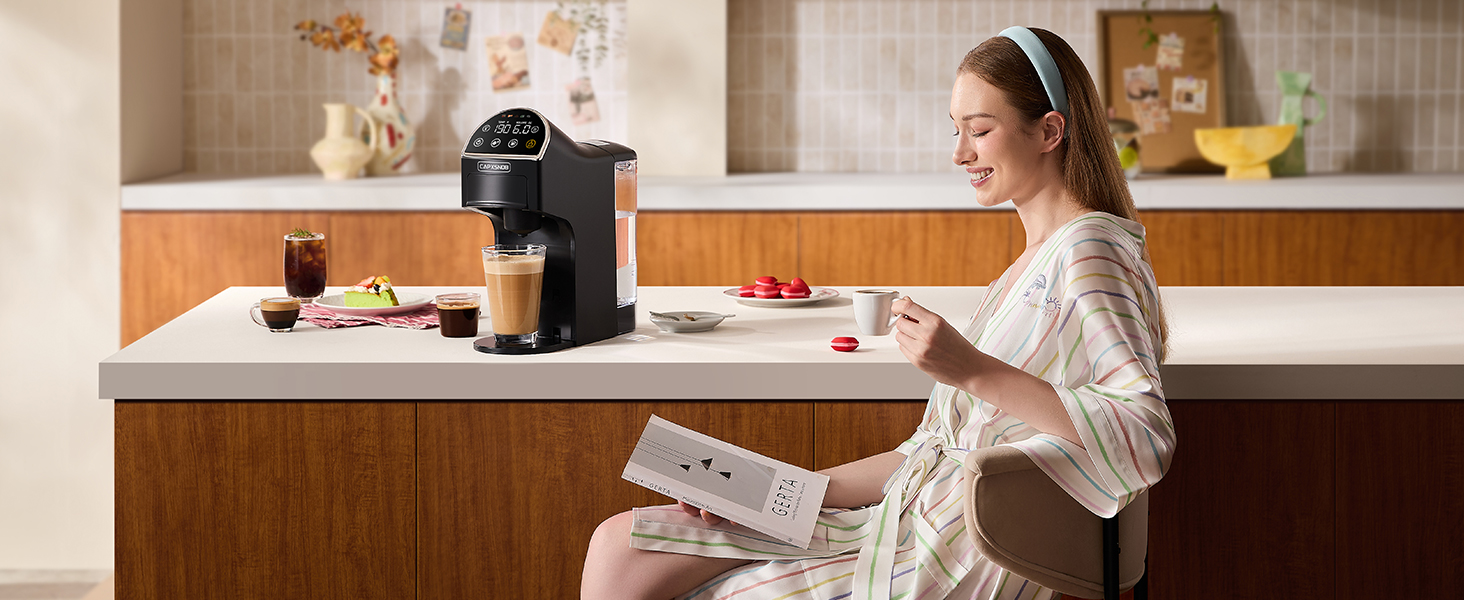 Cozy weekend vibe with a woman tasting café-quality coffee at home, made by Magician2 Mini.