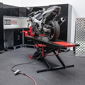 Sports Bike Raised on Black Widow Motorcycle Lift Table in Garage for Service Maintenance with Pedal