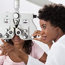 Eye doctor with patient