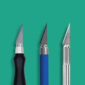 #11 blade on black k26, blue k18 and aluminum k1 knives