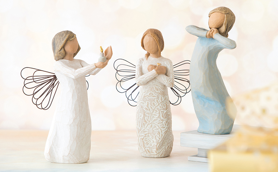 Various Willow Tree figures representing hope and remembrance