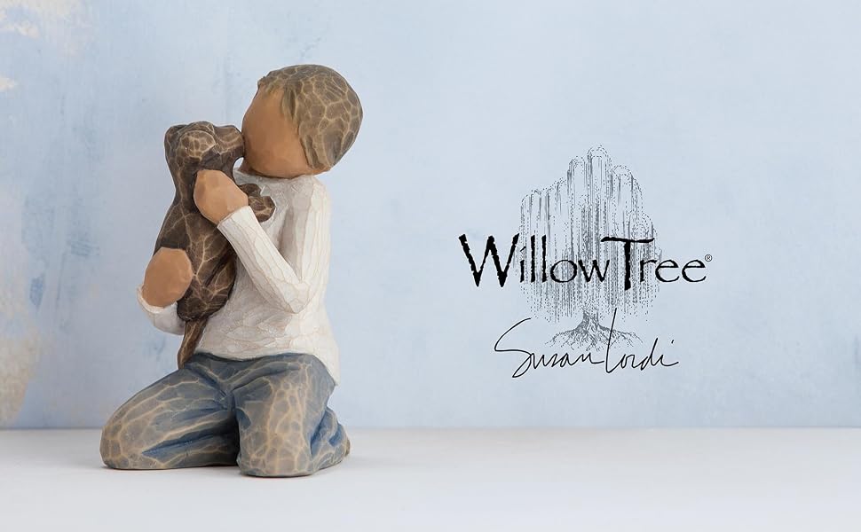 Willow Tree Kindness (boy) figure of kneeling boy holding golden dog in arms.