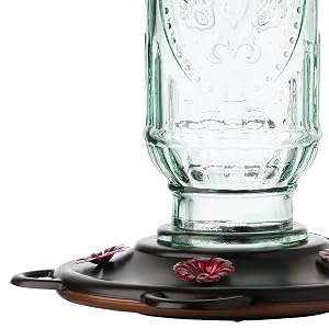 More Birds Vintage Glass Hummingbird Feeder boasts a durable construction