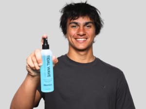 holding tidal wave sea salt spray