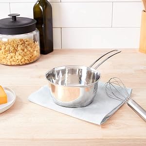Mini Saucepan with whisk on counter