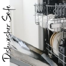 Clean dishes in open dishwasher