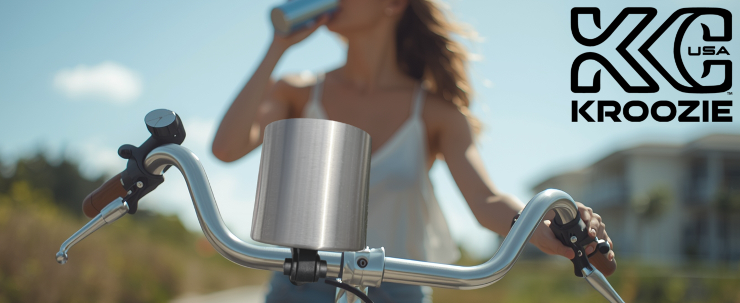 person taking a drink from a bike water bottle holder handlebar mount