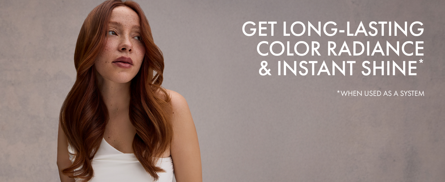 Young woman with vibrant wavy red hair and bold expression beside benefit text.