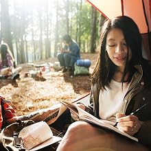zebra tactical ballpoint pen featured in a camping scenario
