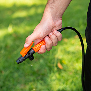 Manual pump with adjustable nozzle.
