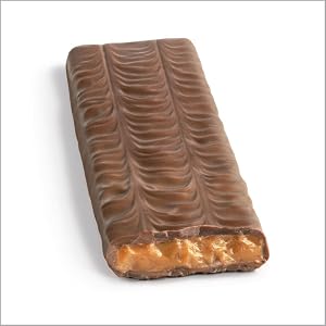Unwrapped full size Skor candy bar broken open to show its toffee center