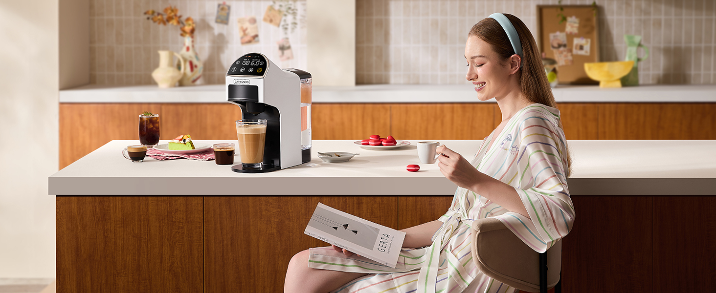 Cozy weekend vibe with a woman tasting café-quality coffee at home, made by Magician2 Mini