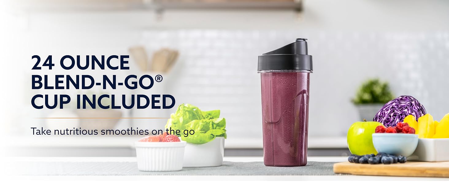 Oster 24 oz Blend-N-Go cup filled with purple smoothie surrounded by fresh fruit