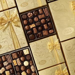 Gold boxes of chocolates in a row