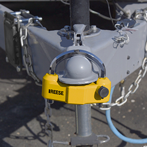 REESE security coupler lock on a trailer coupler preventing theft