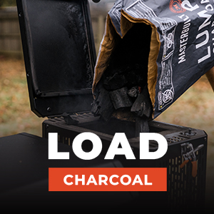 Loading charcoal into the hopper