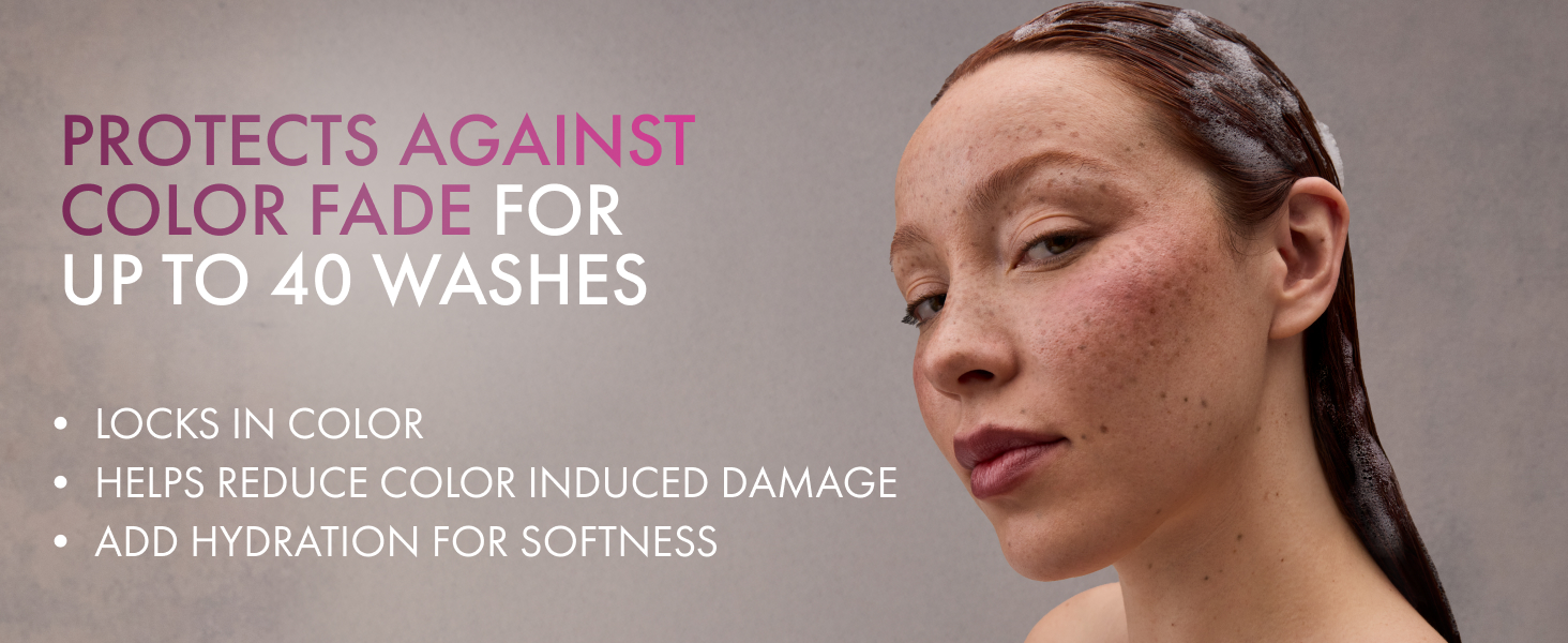 Young woman with freckles and wet red hair covered in shampoo foam beside color protection text.