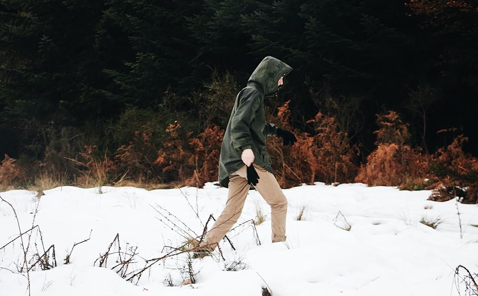 man hiking in snow