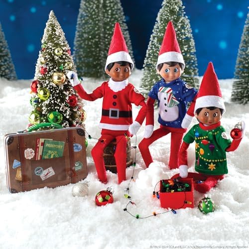 The Elf on the Shelf Claus Couture Suitcase Duo: Sweet Treats Pack and Christmas T-Shirt Party Pack