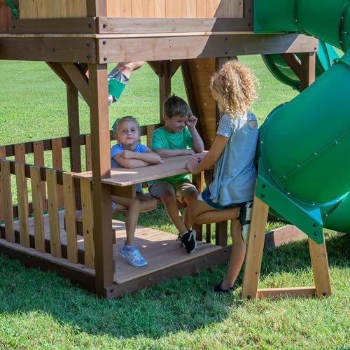 Backyard Discovery Skyfort All Cedar Swing Set, Elevated Covered Wood Roof Clubhouse with Bay Windows, 2 Belt Swings, Web Swing, 10ft Wave Slide