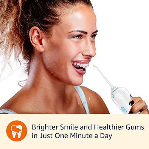 Amazon Basics HydroClean Portable Cordless Water Flosser for Teeth and Gums, 2 Pressure Tips, Removable Tank, 30 Seconds Water Capacity