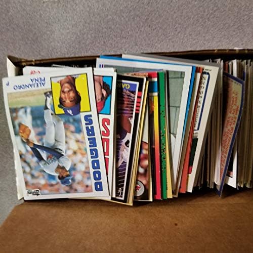 600 Baseball Cards Including Babe Ruth, Unopened Packs, Many Stars, and Hall-of-Famers. Ships in White Box Perfect for Gift Giving.