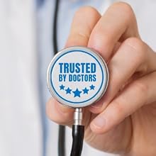 Hand holding stethoscope with Trusted by Doctors written on it