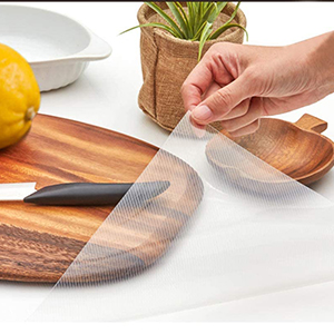 As placemats: Pad under the cutting board to prevent food from falling under the cutting board