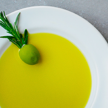 Bowl with green olive and EVOO