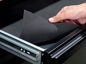 Detailed view of pre-cut drawer liners, designed to prevent tools from sliding