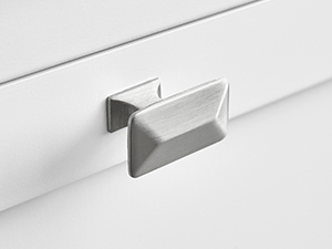 Close-up of two silver rectangular drawer handles or pulls mounted on a white surface, showcasing minimalist design.