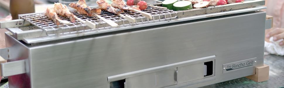 The Bincho Grill with shrimps and vegetables being grilled
