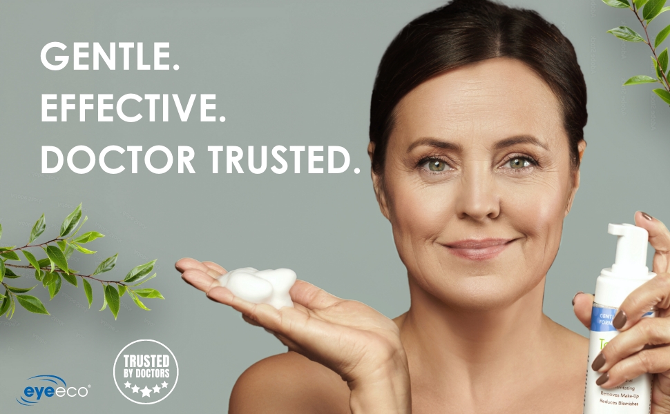 mature woman holding foam/facial cleaning product in her hands. Gentle. Effective. Doctor Trusted.