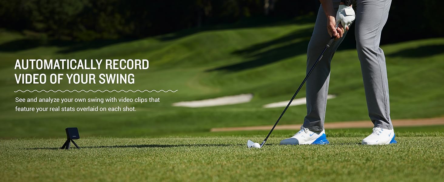 A golfer is using a Portable Golf Launch Monitor to automatically record his swing.