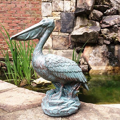 homestyles 20 in. Pelican on Ocean Coastal Rock Collectible Beach Statue-Bronze Patina Finish