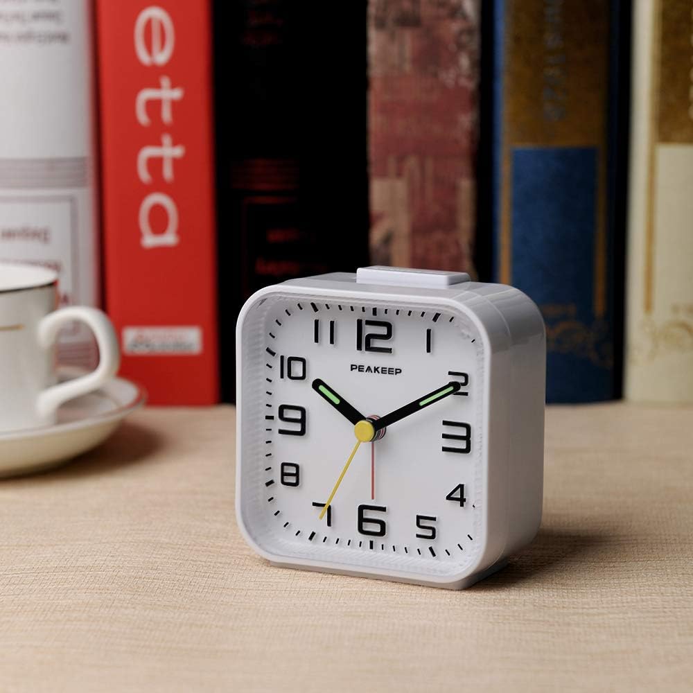 Peakeep Small Battery Operated Analog Travel Alarm Clock Silent | No Ticking, Lighted on Demand and Snooze, Beep Sounds, Gentle Wake, Ascending Alarm, Easy Set (Black)