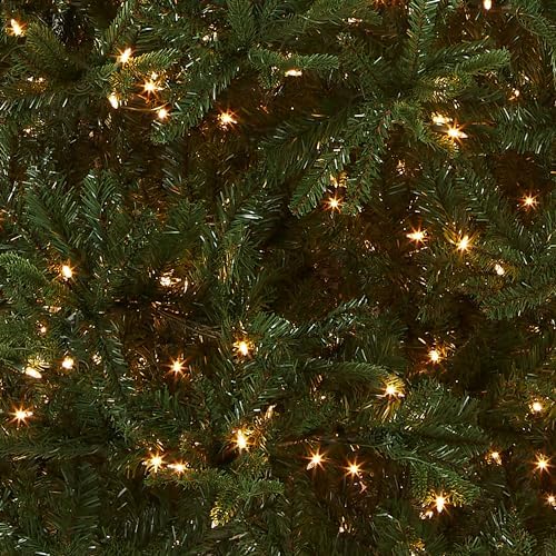 National Tree Company 7.5ft Pre-Lit Tiffany Fir Slim Christmas Tree | 600 Clear Lights, 1,878 Tips, Includes Stand, Artificial, Green