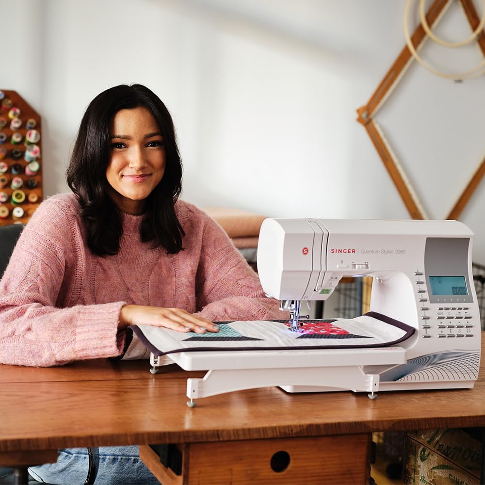 SINGER® Quantum Stylist 9960 Computerized Sewing & Quilting Machine | Hard case, extension table, 13 presser feet included, 600 stitches, 5 fonts, LED light, metal frame, 13 one-step buttonholes
