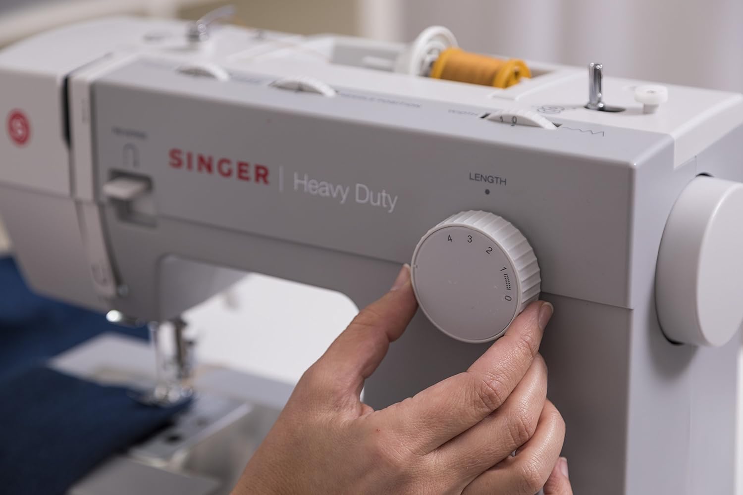 SINGER | Heavy Duty 4411 Sewing Machine with 11 Built-In Stitches, Accessory Kit, Includes 9 Presser Feet, Twin Needles, & Case - Sewing Made Easy