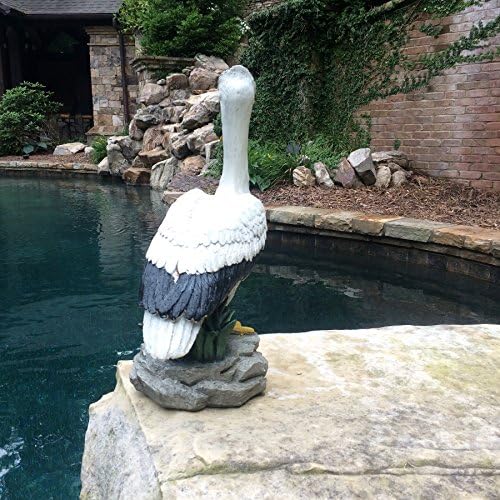 homestyles 20 in. Pelican on Ocean Coastal Rock Collectible Beach Statue-Natural Finish