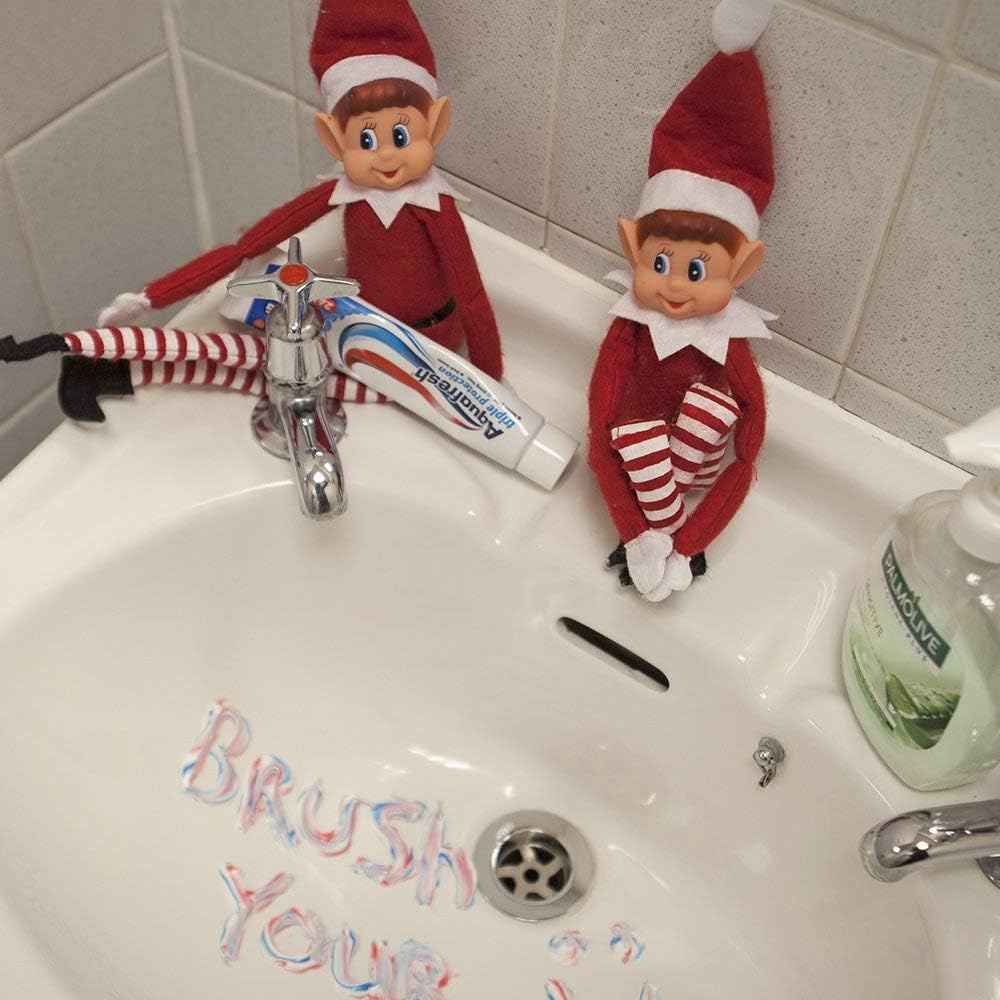 Glow Set of 2 Naughty Little Xmas Elves - Playful Elf Figure with Soft Body, Vinyl Face, Hook and Loop Grip Elves Behavin’ Badly Christmas Family Elfie Elvie Toy Boy Girl