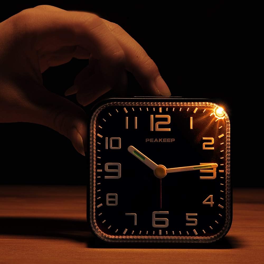 Peakeep Small Battery Operated Analog Travel Alarm Clock Silent | No Ticking, Lighted on Demand and Snooze, Beep Sounds, Gentle Wake, Ascending Alarm, Easy Set (Black)