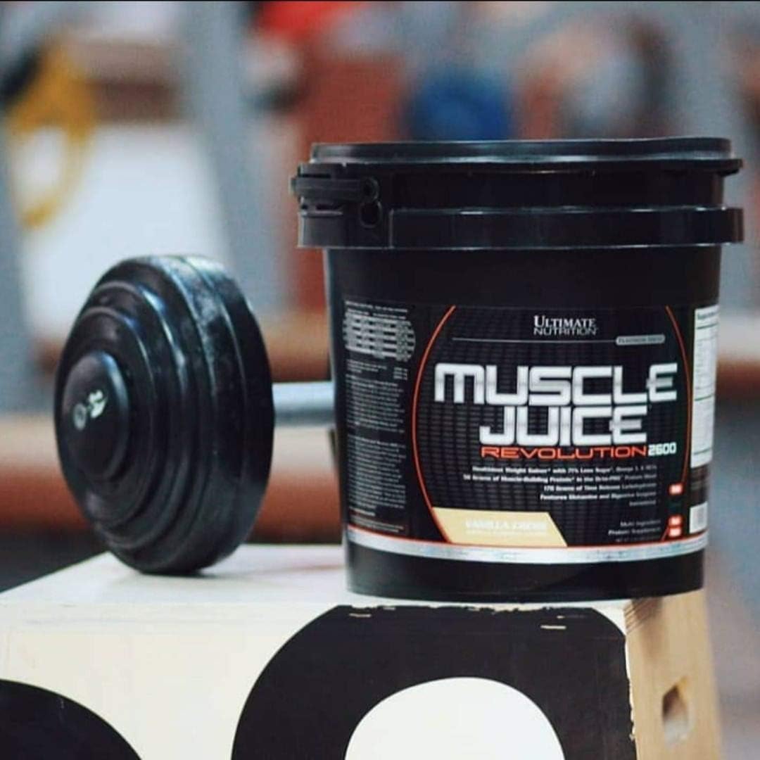Ultimate Nutrition Muscle Juice Revolution 2600 Weight Gainer, Muscle Recovery with Glutamine, Micellar Casein and Time Release Complex Carbohydrates, Banana Protein Powder, 4.69 Pounds | 70g Octo-PRO™ Protein Blend, 175g Time-Release Carbs, 1000mg Gluta…