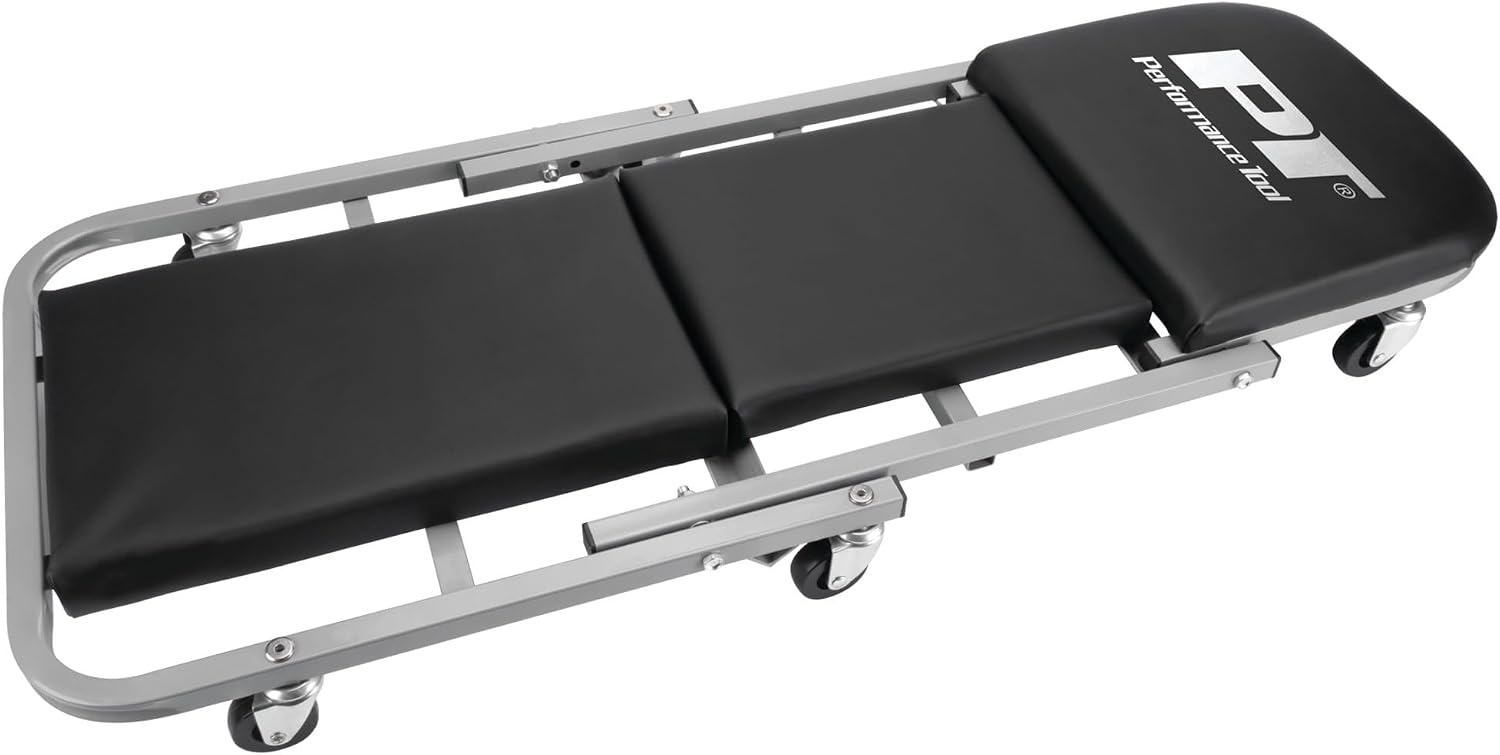 Performance Tool W85014 38 in. Low-Profile Automotive Mechanics Creeper | Oversized x-frame low profile creeper with 2-inch extra cushion padding. 5-inch jumbo swivel casters. 300 lb. capacity