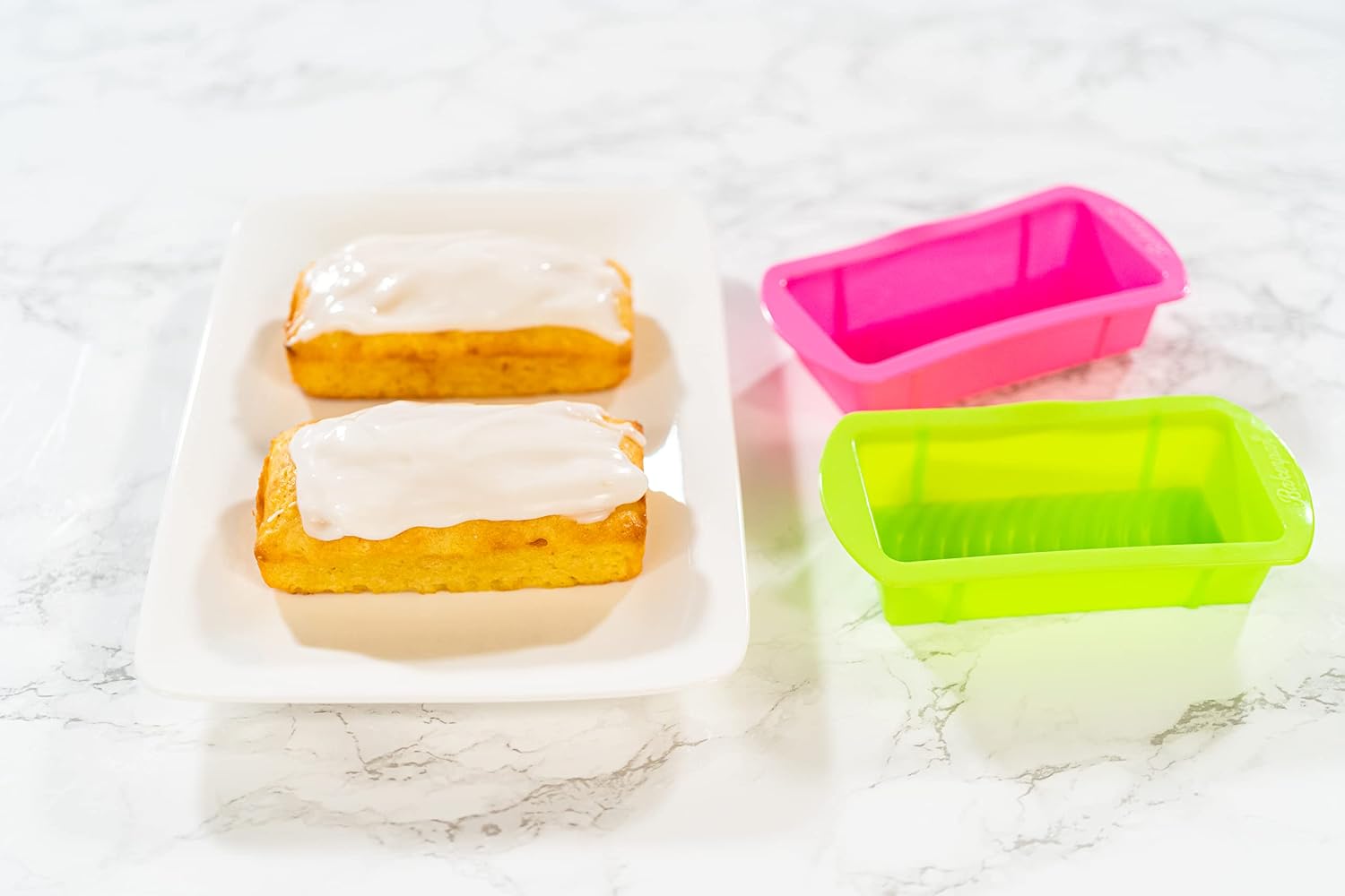 Bakerpan 4 Pack Silicone Mini Loaf Pans for Baking - 4.5 Inch Reusable Molds for Banana Bread, Pound Cake, Bread Loaves & Mini Cakes - Non-Stick