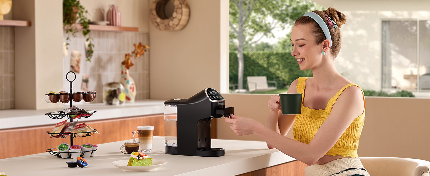 Woman with a morning espresso by Magician2 Mini, brewing a quick cup in 30s to energize the day.