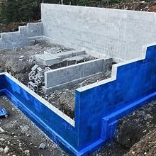 Blue Max Liquid Rubber waterproof coating applied to an exterior foundation before backfilling.